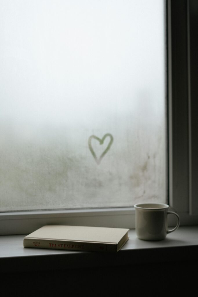 Heart drawn on fogged glass, symbolizing emotional healing, connection, and the supportive tools you'll receive in this trauma-informed parenting program.